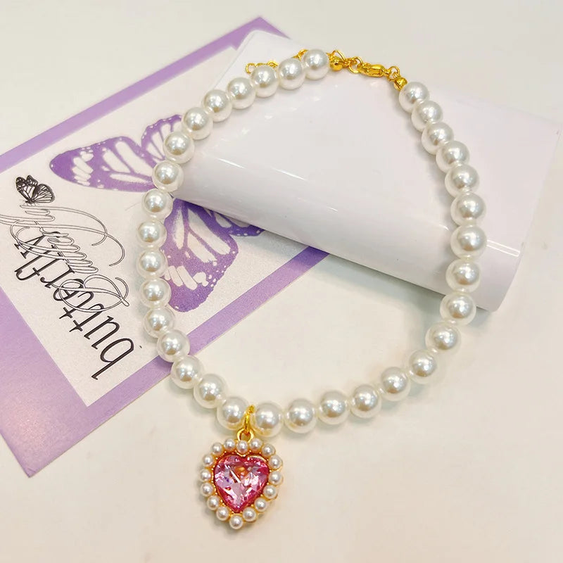 Collier de perles pour chat avec coeur rose strass
