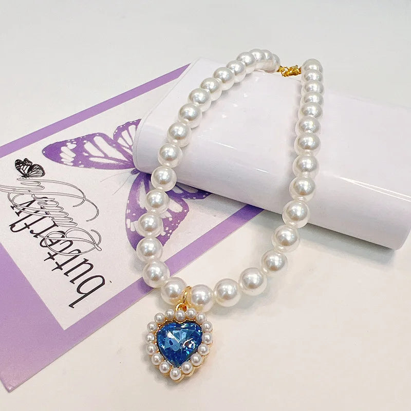 Collier de perles pour chat avec coeur bleu strass