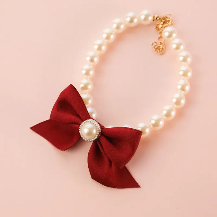 Collana di perle per gatti con fiocco