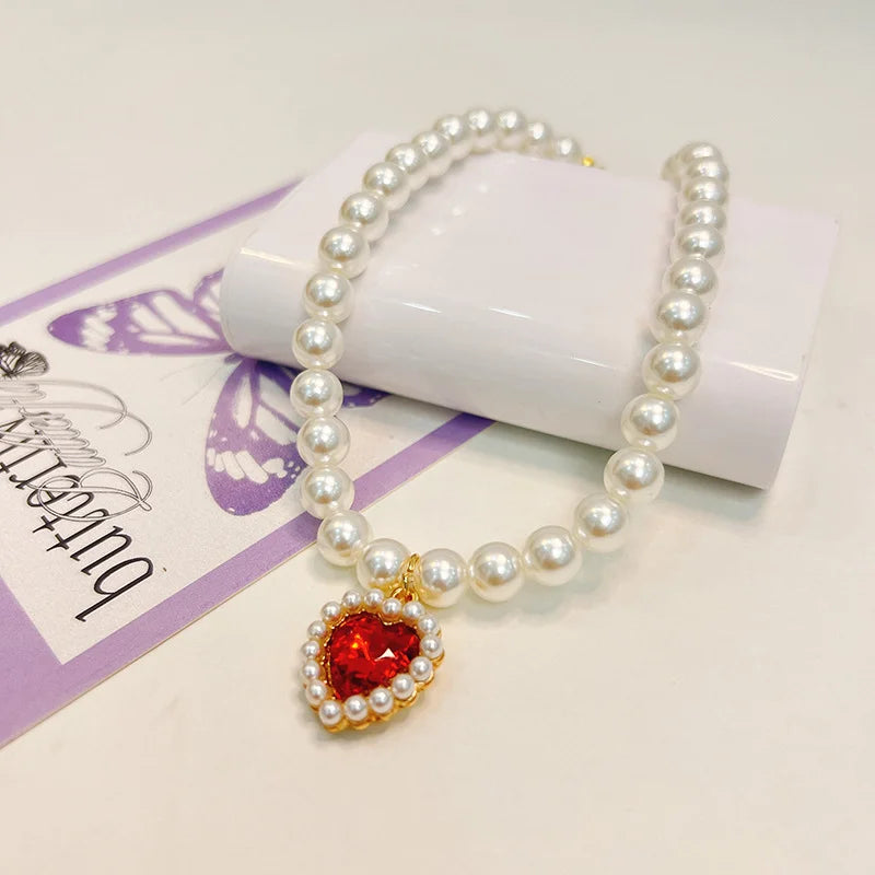 Collier de perles pour chat avec coeur rouge strass