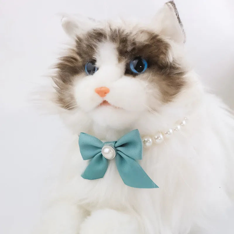 Collier de perles pour chat à noeud vue de détail